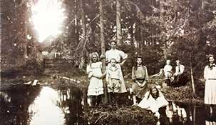 Louise as a young woman with her cousins